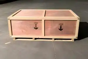 Wooden shipping crate with two downward arrows marking positions along its base.